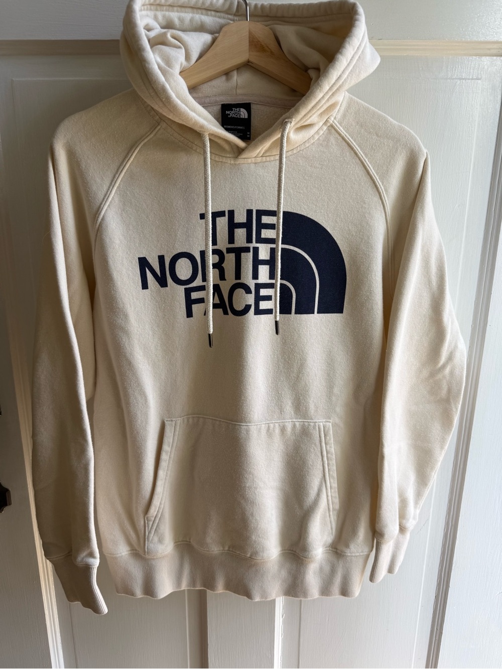 The North Face Cream Hoodie with Navy Logo